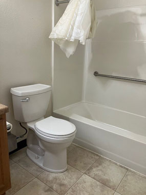 Agassiz Apartments Bathroom Toilet and Bathtub